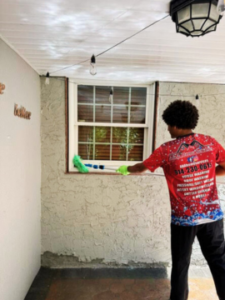 Professional window cleaning service making residential windows spotless and streak-free
